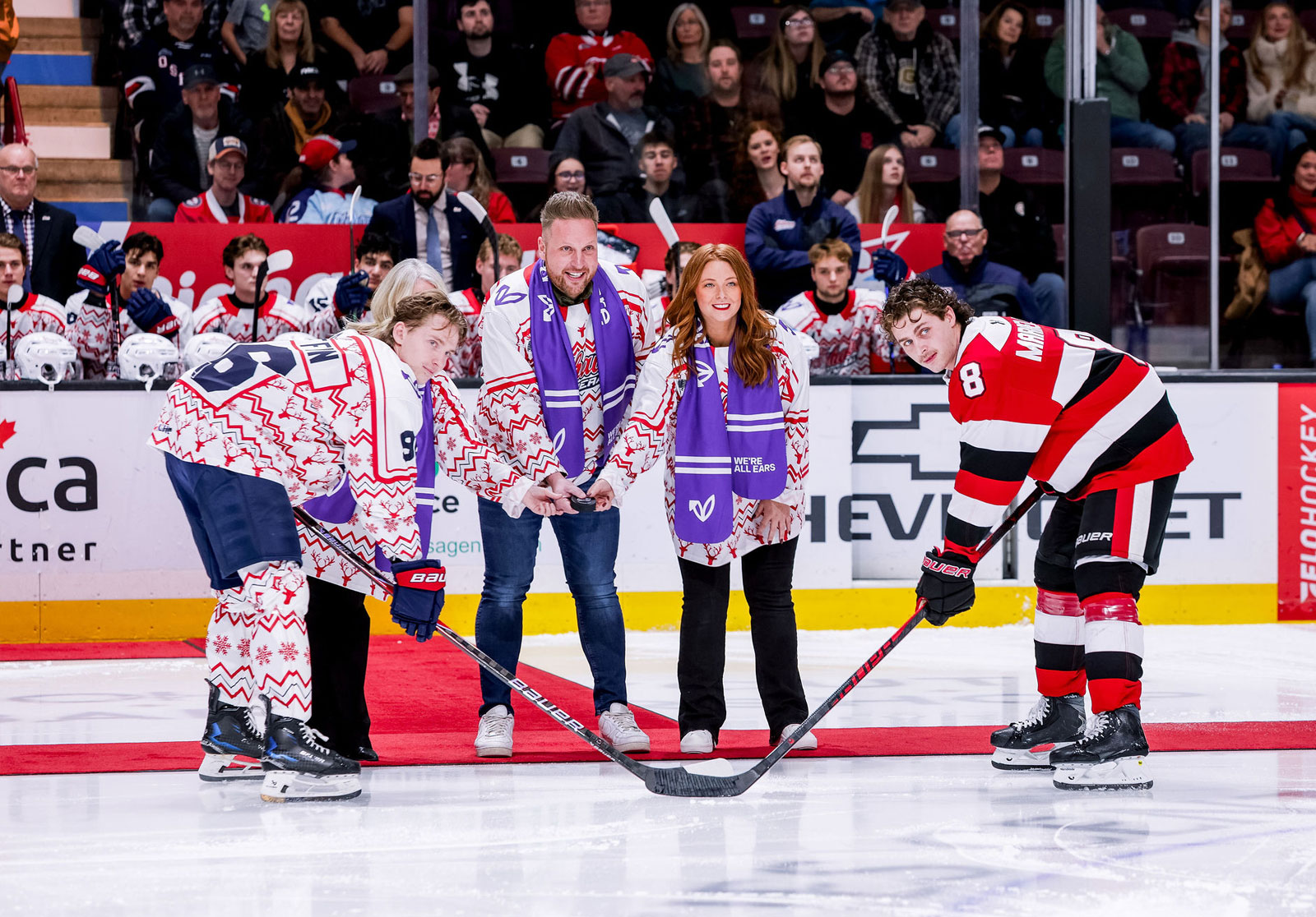 PetleyHare President, Adam Hare and Vice President, Ashley Holmes drop the puck at the Oshawa Generals Holiday Hope Night Game